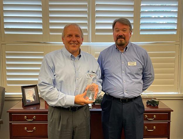 (L-R) William S. Helmly, CEO of Home Telecom and Andy Olsen, Business Development Manager for SCRA